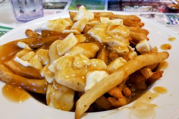 Order "L'Originale," or poutine dressed in the style of the 1964 original.