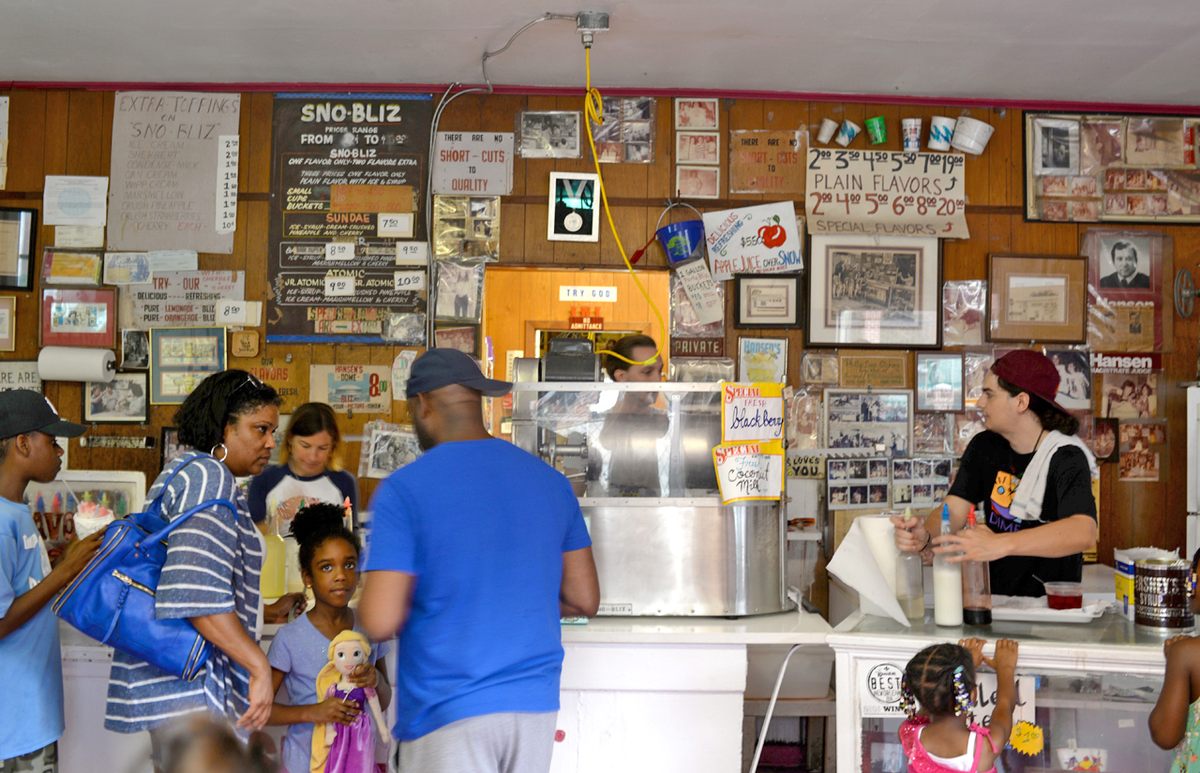 Inside Hansen's Sno-Bliz, decades of neighborhood history cover the walls.