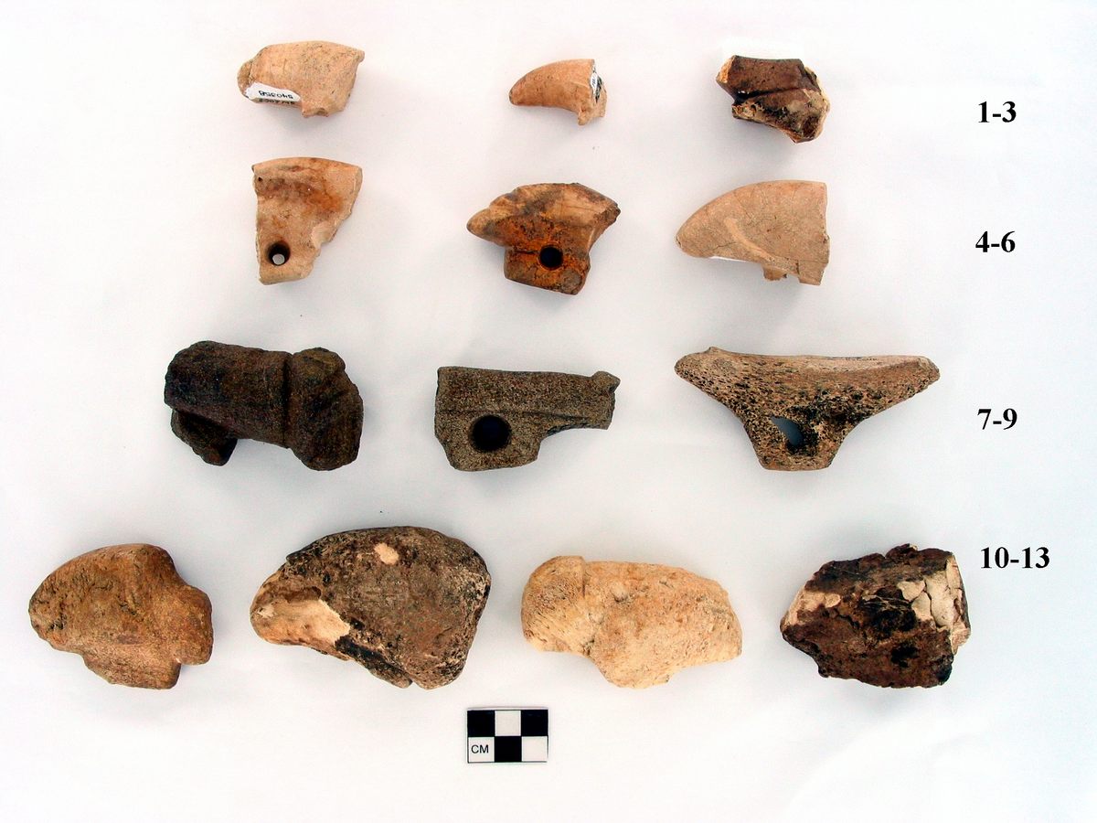Atlatl weights, both adult- and kid-sized.