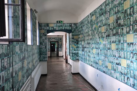 Hallway (lined w/photos of the incarcerated)