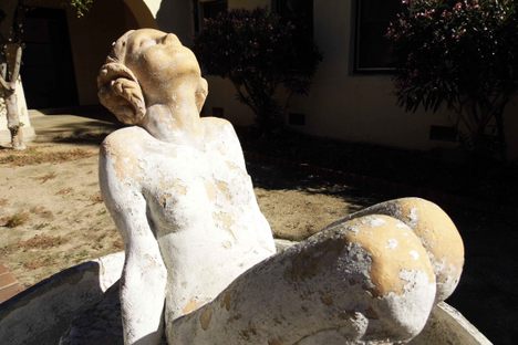 Abandoned statues on the garden grounds