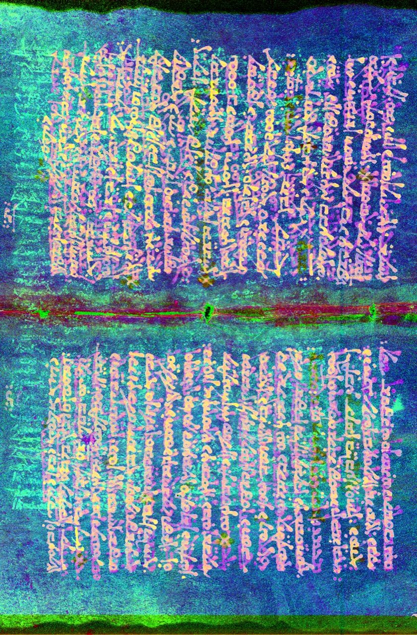 The scanned pages can reveal never-before-seen text, like this passage in green, which runs perpendicular to the hymns.