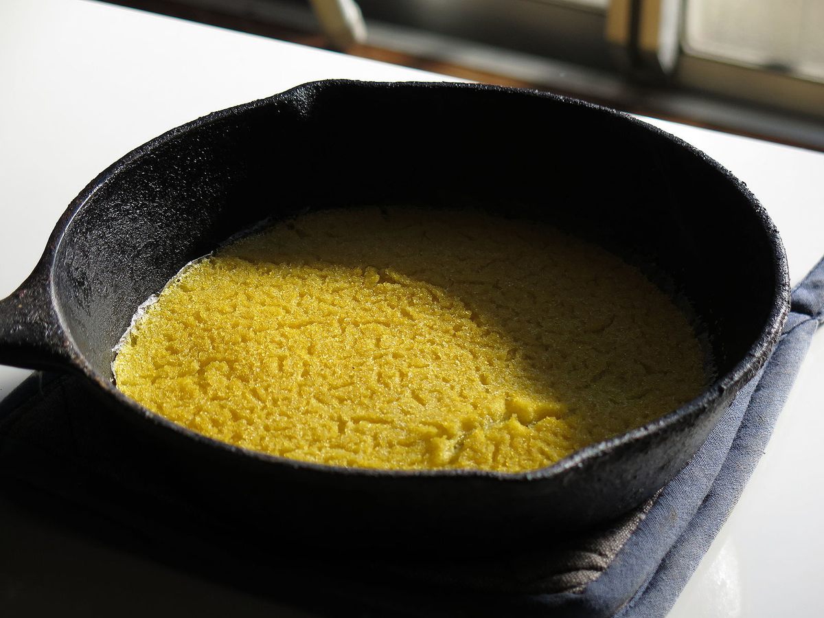A Johnnycake in a cast-iron skillet—made from ingredients you might already have in your pantry.