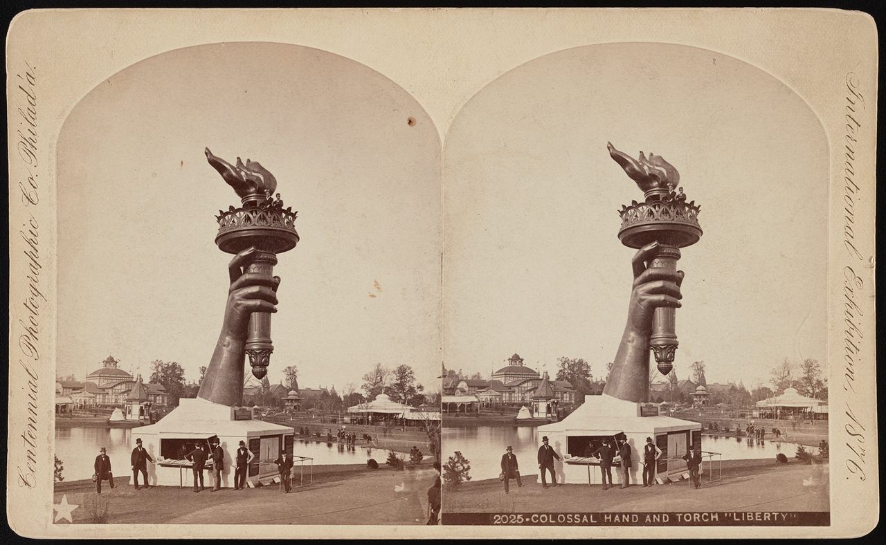 The torch and part of the arm of the Statue of Liberty, on display at the 1876 Centennial Exhibition in Philadelphia. 