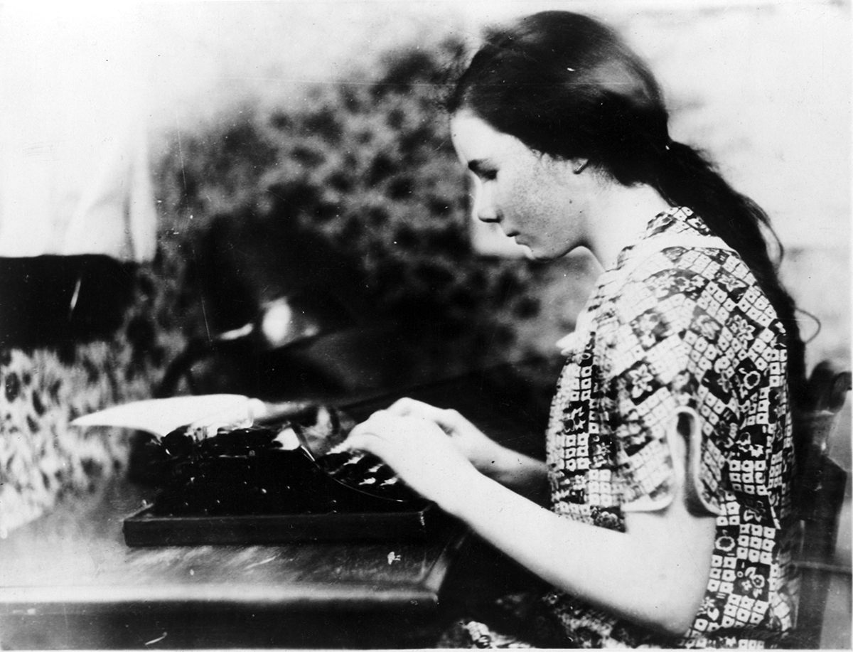 Follett at her typewriter in 1928. 