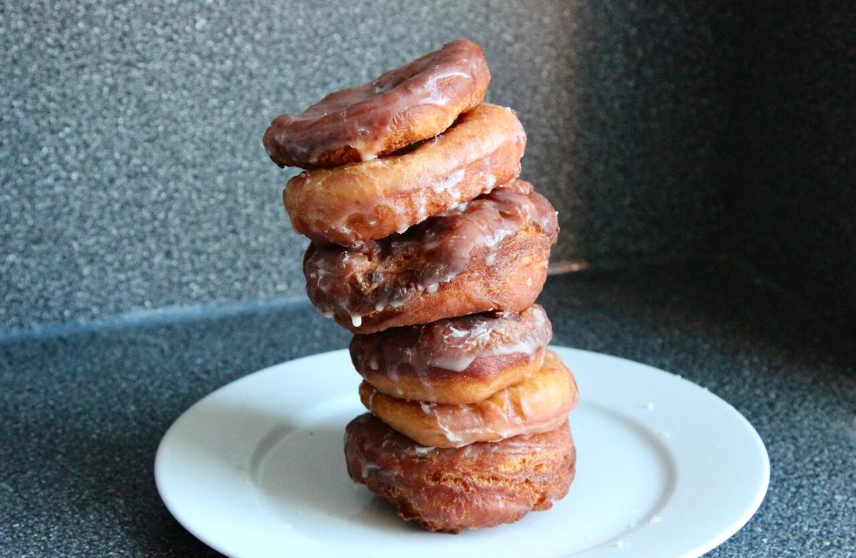 A glorious tower of freshly fried spudnuts.