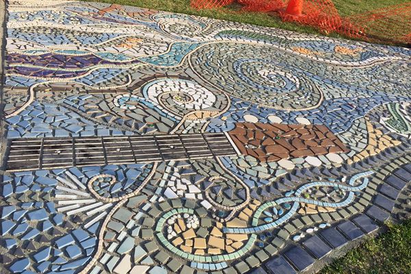 Guitar in sidewalk in progress.