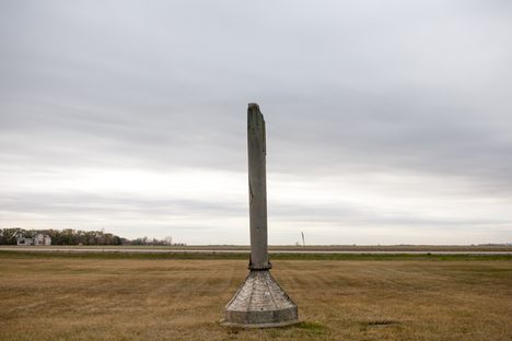 The monument stands in a lonely cemetery.