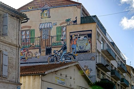 Wall near a motorcycle shop.
