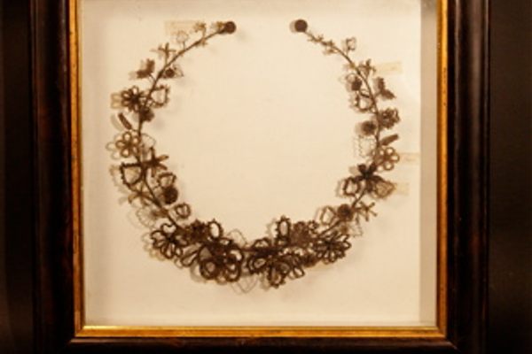 One of the "fancy craft" Victorian hair wreaths in the collection of the Colorado Springs Pioneers Museum. Photo by Noel Black. 