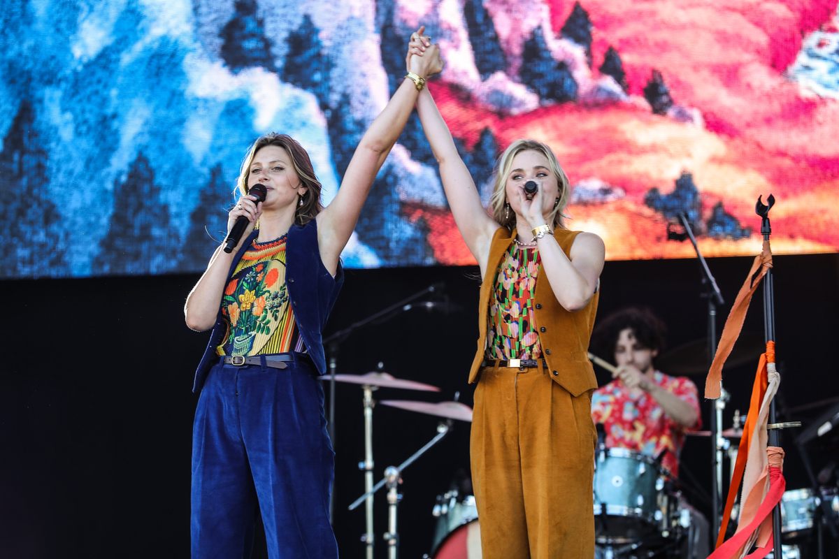 Aly & AJ performing at Governors Ball 2022 at Citi Field in New York—both wearing their vintage watches.