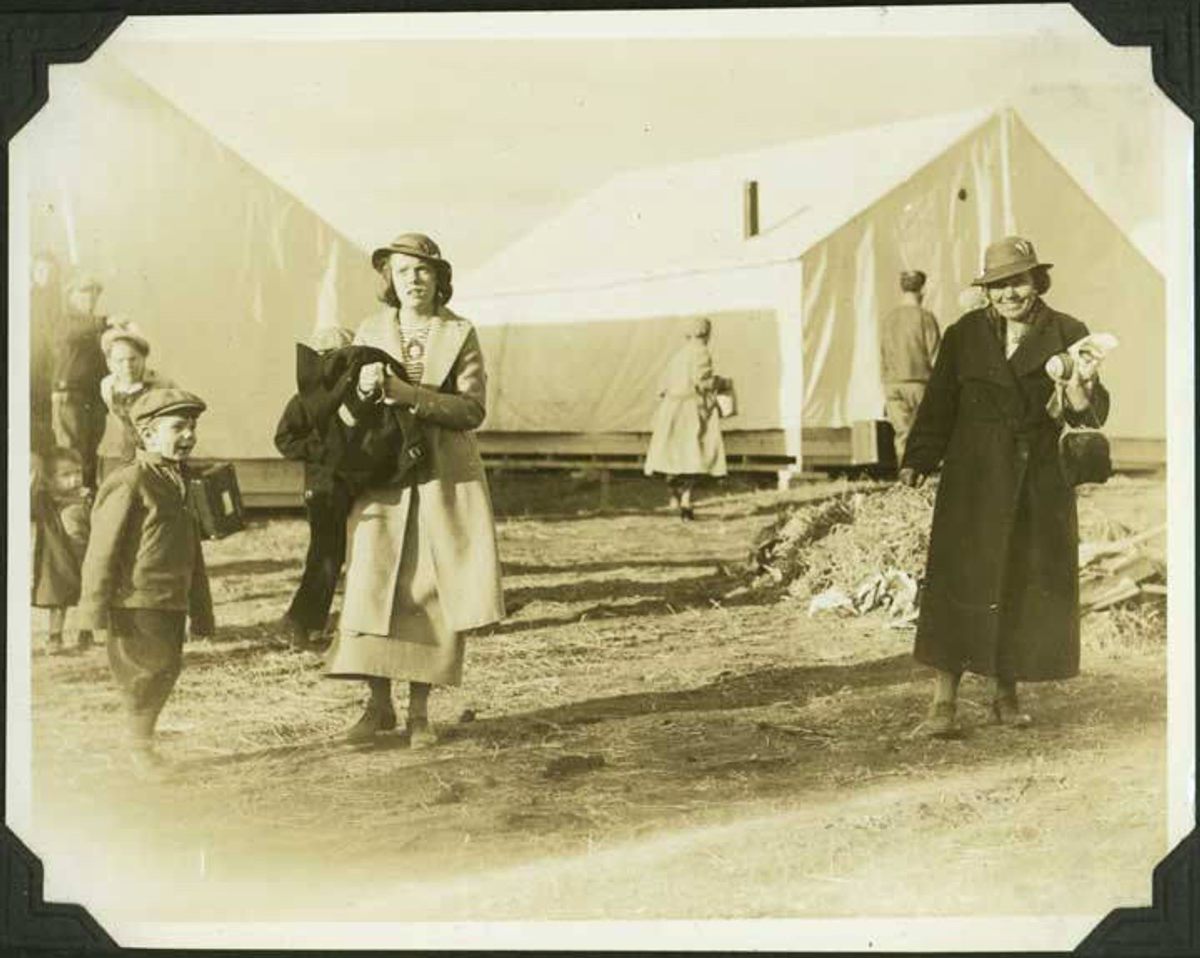Colonists in front of tents in 1935 before the town was built.