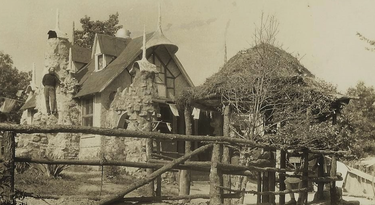 An undated image, believed to be from the 1930s, which inspired the illustration at top; George Daynor can be seen at far left, standing on part of a chimney.