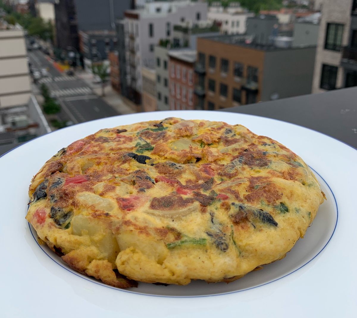 This Spanish tortilla comes with adult cicadas inside.