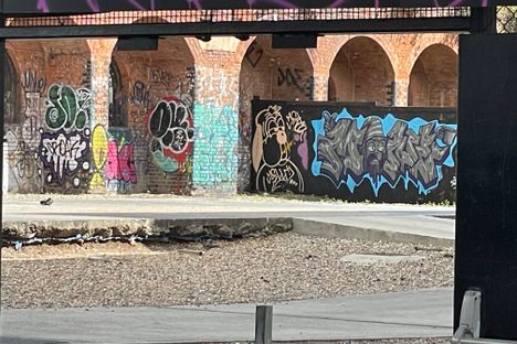 In the lot behind the locks. (Other street art as well)