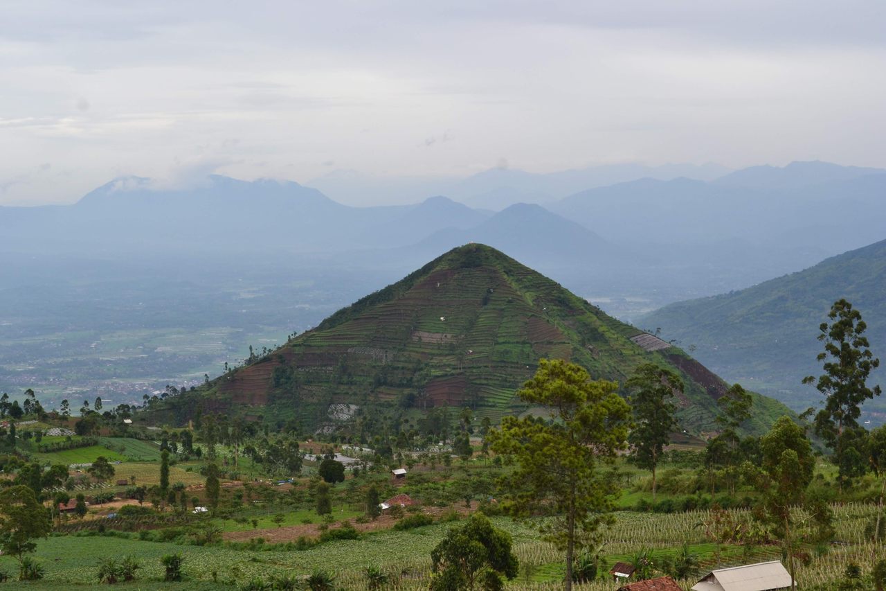 Humans began sculpting a small hill into a larger pyramid almost 25,000 years ago, and then building layers of sand and rocks on top of that.