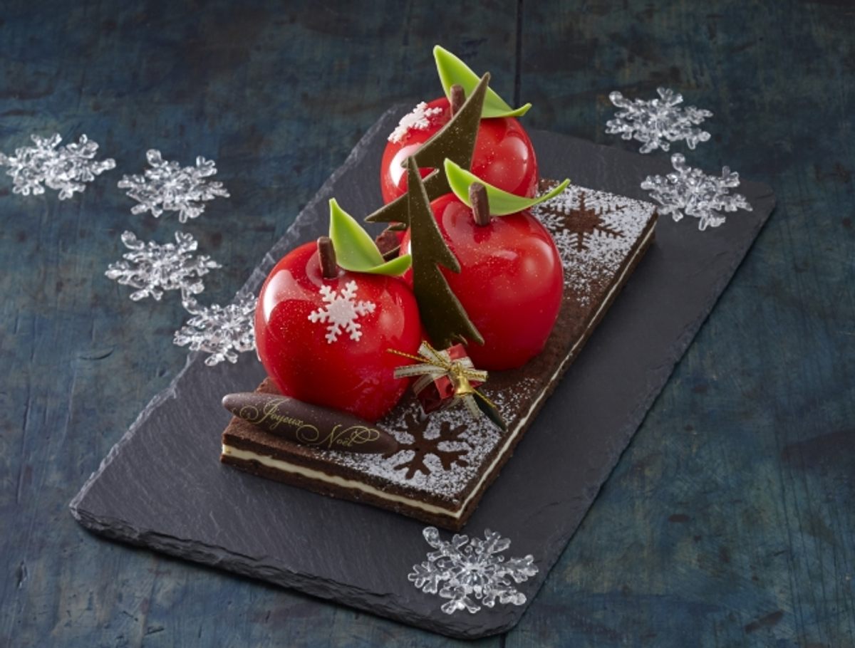 The Pomme Tatin Nöel is Lyon-based pâtissier Sébastien Bouillet's riff on a <em>forêt-noire</em>, the French version of a Black Forest cake. Sold at the Ginza Mitsukoshi department store in Tokyo, it has a chocolate sponge and mascarpone cream base, topped with apples made of almond-vanilla mousse, biscuit-macaron (a meringue with almonds), and caramelized apple compote.