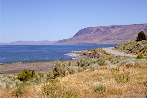 Lake Abert from the south.  The highway is US 395.  Abert Rim on the skyline.
