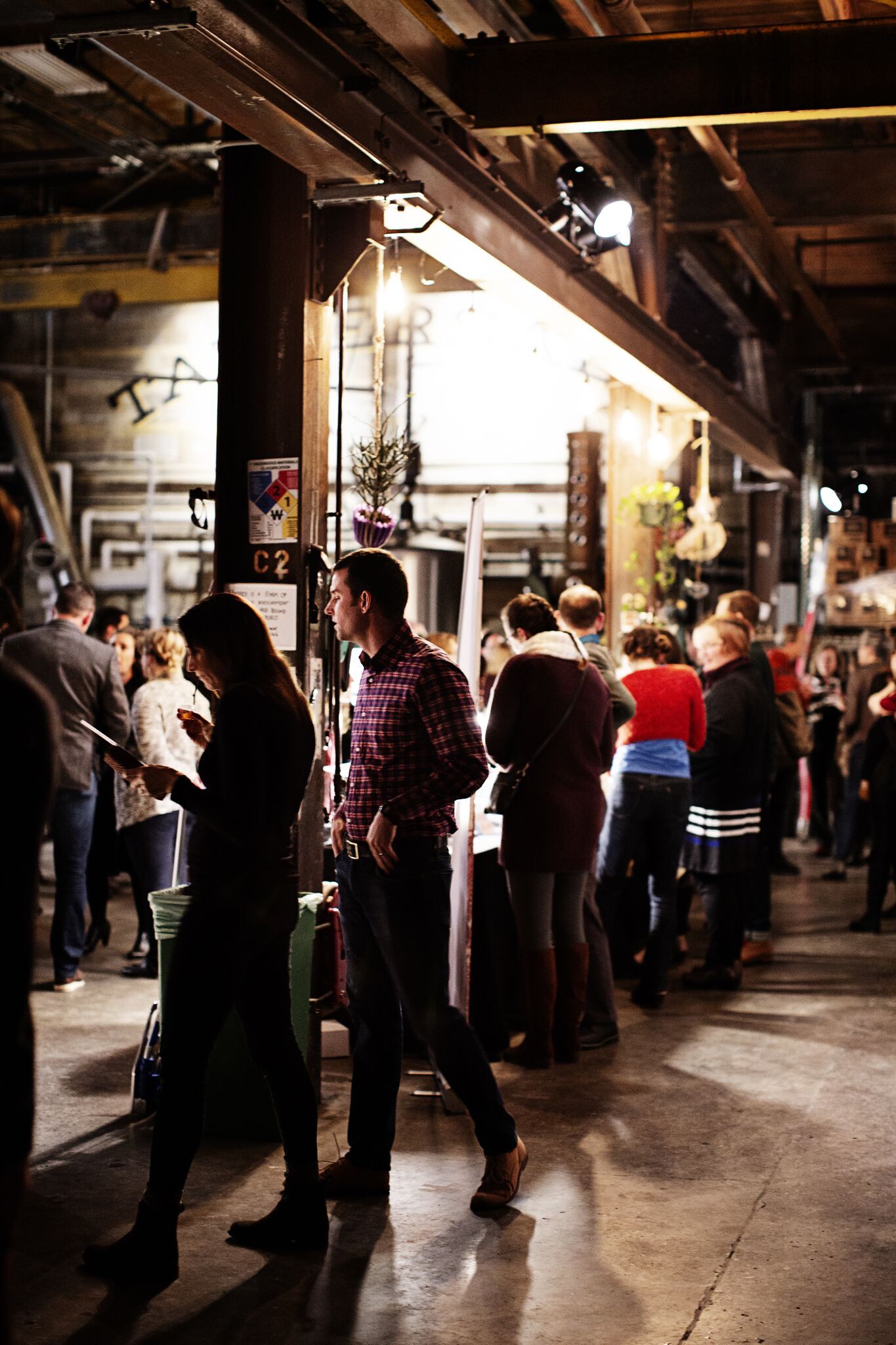 Guests sample early-modern-inspired drinks and food at the Tattersall Distilling's collaboration with MIA in early 2019.