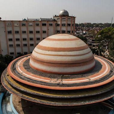 The planetarium's Saturn-shaped building measures nearly 70 feet in diameter.