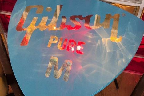 This table is a giant guitar pick. 