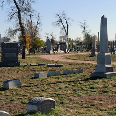 Statues and headstones mark the final resting place of Denver's early pioneers.