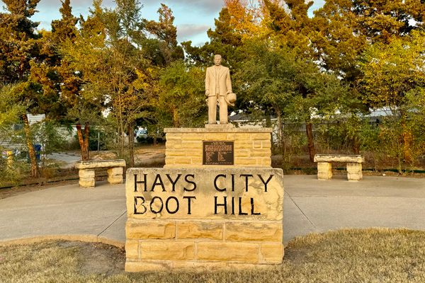 Statue and sign