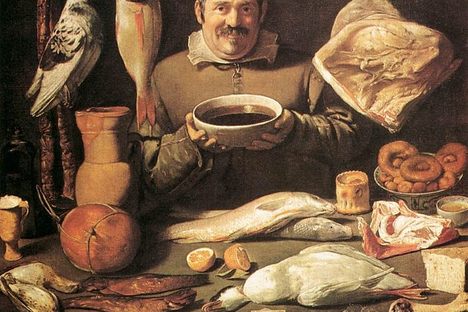 A 17th-century chef surrounded by foods of the day.