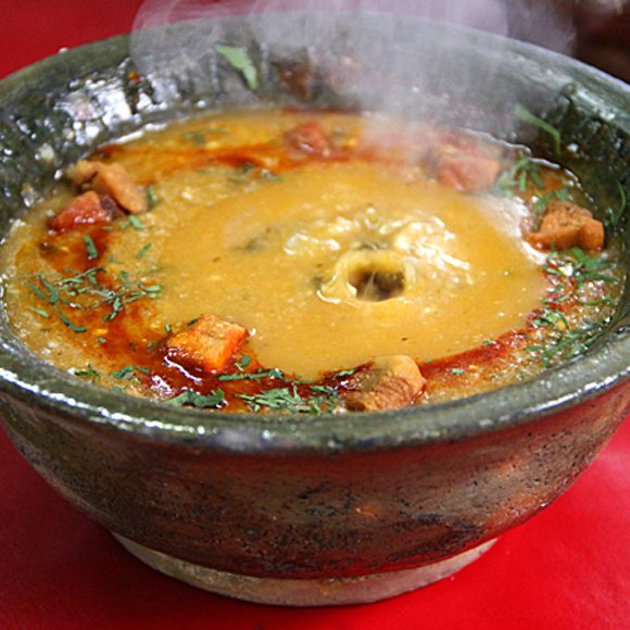 A steaming bowl of k’alapurka, right after the stone was dropped inside.