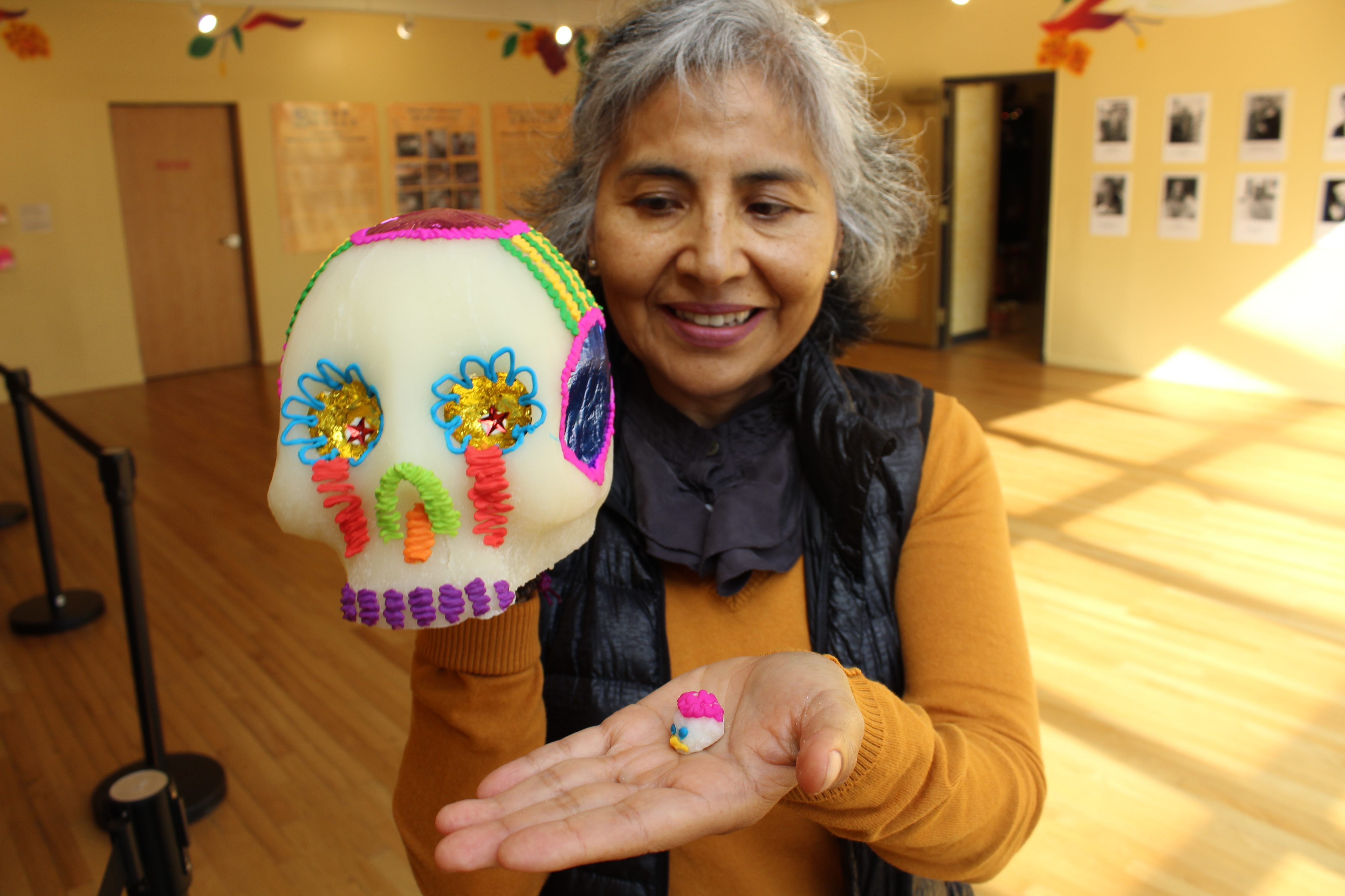 Elizabeth Quan Kiu, modeling for perspective, the largest skull.