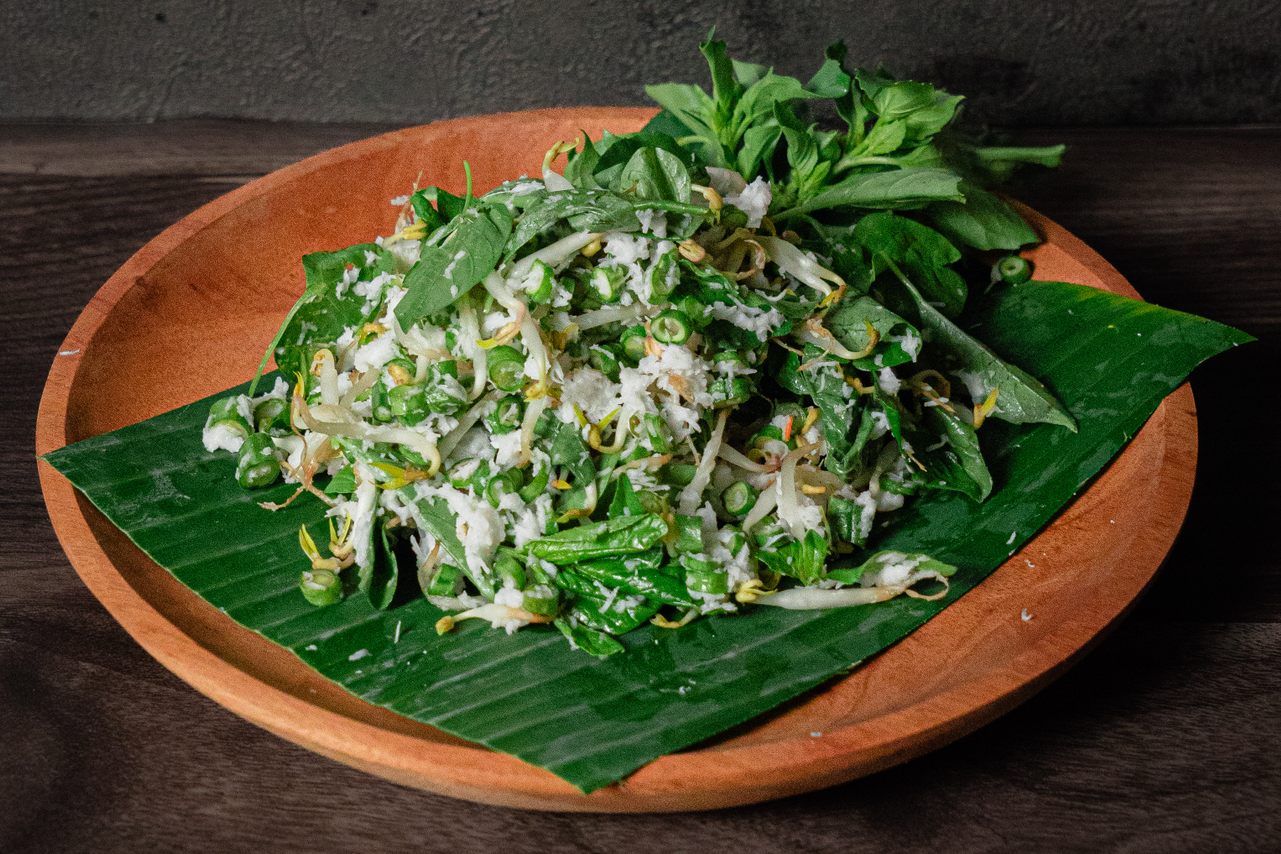 Old Javanese inscriptions describe vegetables eaten raw or boiled and seasoned with fermented shrimp paste.
