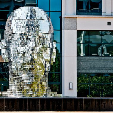 The aligned segments create a human head.