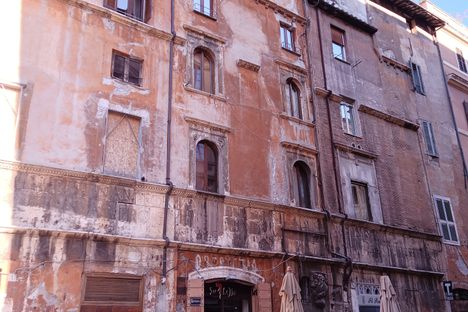 The inscription runs along the building.