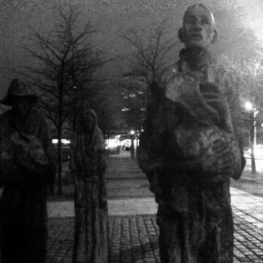 Famine sculptures at night in black and white