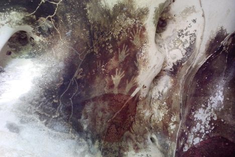 Prehistoric hand prints in a cave in Maros.