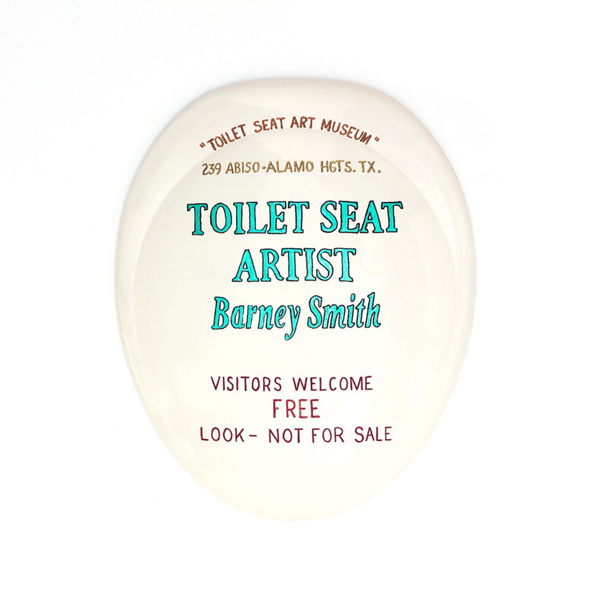 The sign for the museum is, appropriately, on a toilet seat.