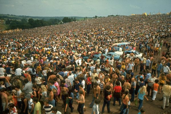 The crowd was much, much bigger than expected, which helped turn a music festival into the stuff of legend. 