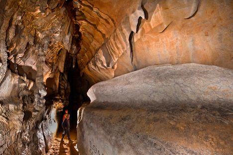 Nearly a quarter-mile into Spain's Atxurra Cave, Paleolithic people carved scores of animals on a wall eight feet above the cave floor. It's now known as the Ledge of Horses.