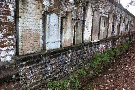 These head markers were dug up and strewn around the cemetery.