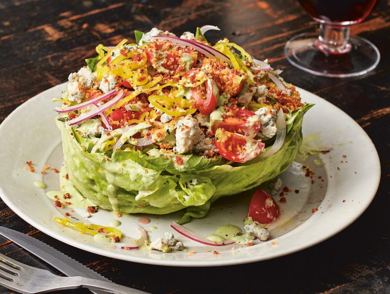 Don Angie's version of a wedge salad includes a creamy anchovy dressing and pepperoni fat-crisped breadcumbs.