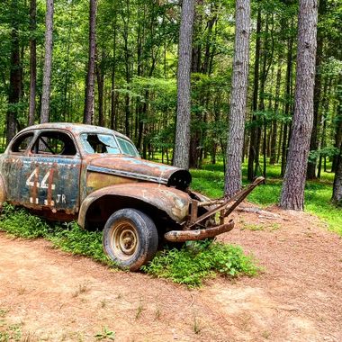Rusty old race cars are still at the old Occoneechee Speedway, which is the last remaining dirt track from NASCAR's inaugural 1949 season.