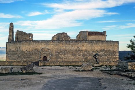 A side profile of the marquis displayed on a wall of Chateau de Lacoste.