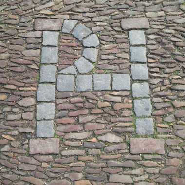 The stone PH marking where Patrick Hamilton burnt at the stake.