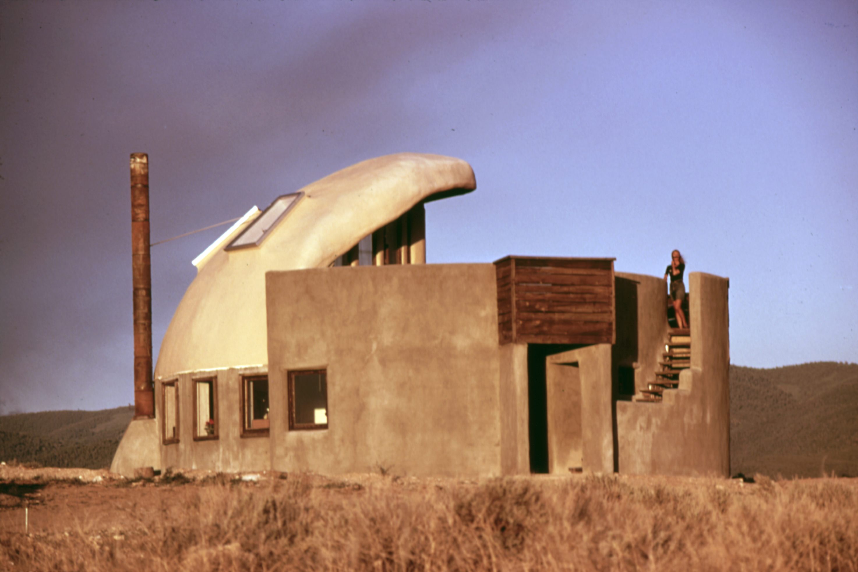 An early Earthship in Taos, New Mexico built with empty beer and soda cans.