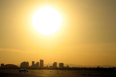 The sun sets over Phoenix, AZ.