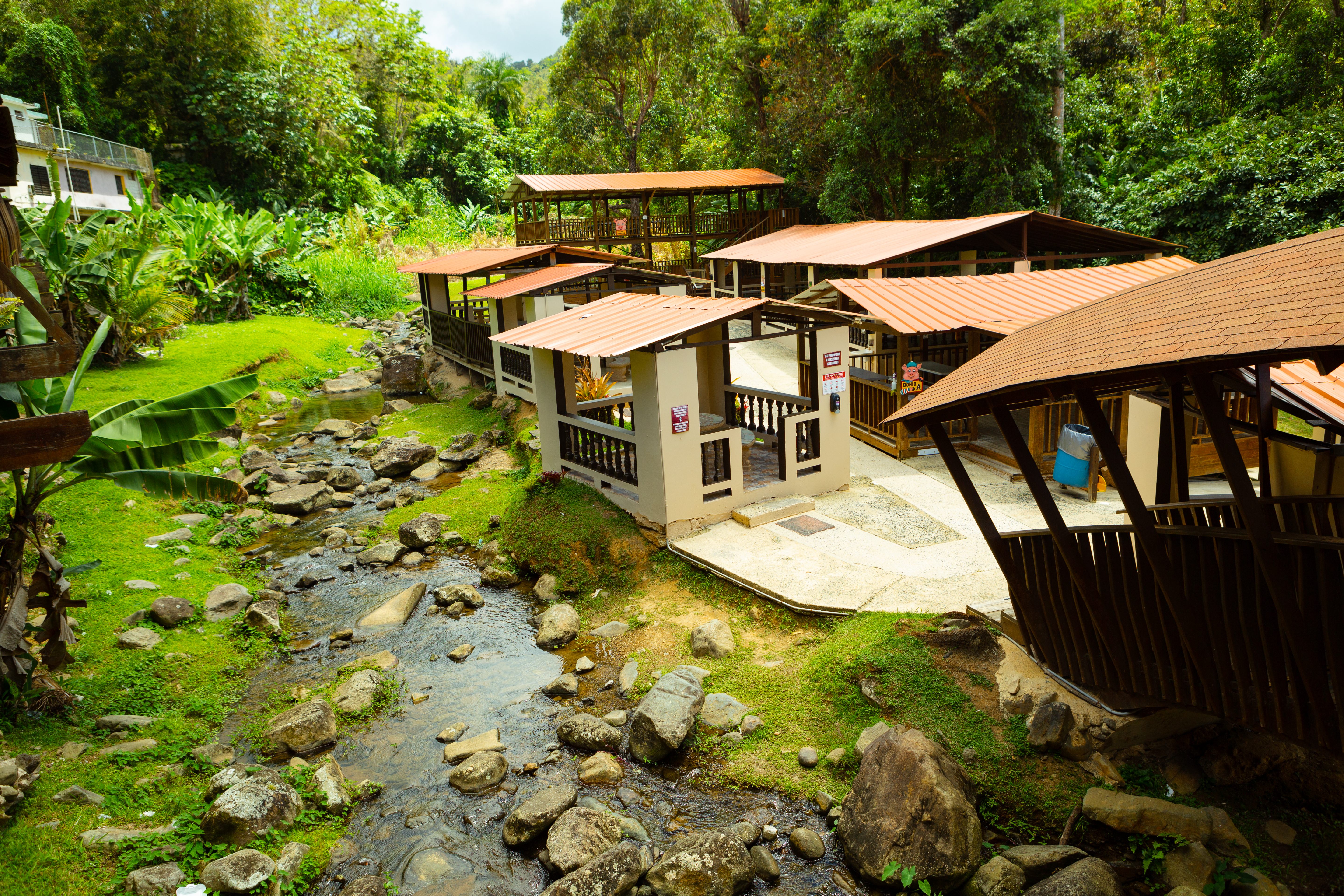 El Rancho Original, a massive two-building lechonera, boasts a stage for live bands and a huge dance floor.
