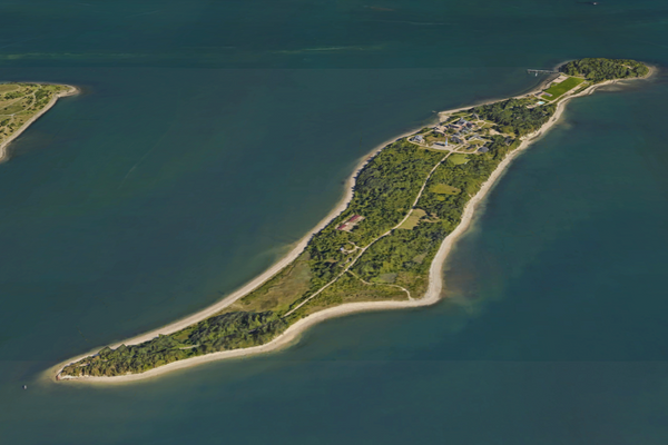 Low-lying Long Island is one of several harbor islands carved off the mainland through the process of erosion.
