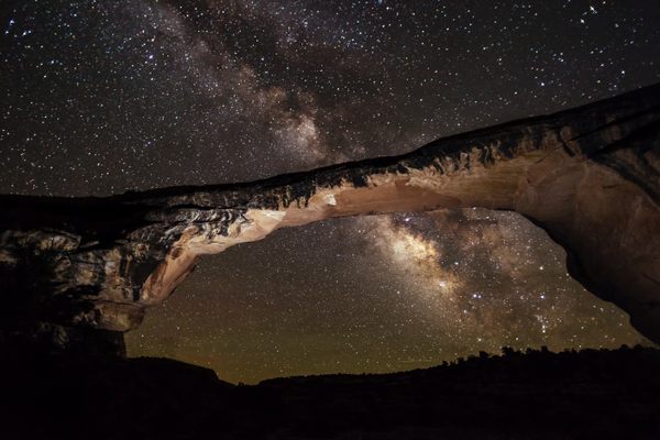 A glorious night sky seen through Owachomo Bridge in Utah's Natural Bridges National Monument, which was named the world's first International Dark Sky Park in 2007.