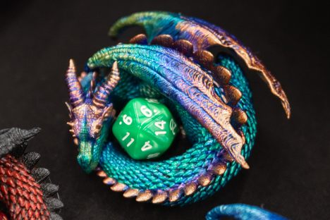 One Gary Con vendor was selling these dragon dice holders. Also known as dice jails, these holders "detain" unlucky dice.