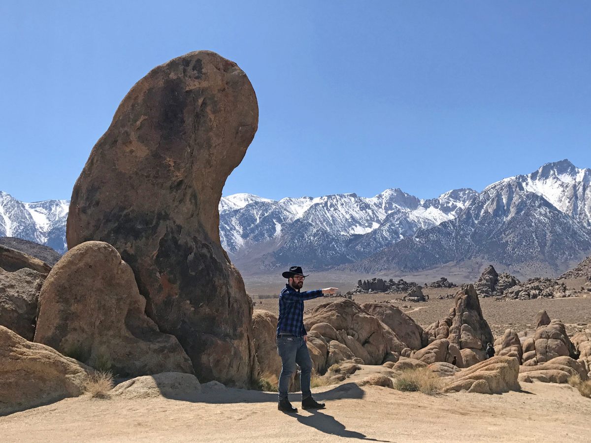 Author Tyler Malone recreates a scene from <em>Boots and Saddles</em>, which was filmed in California's versatile Alabama Hills.